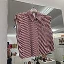 Camicia smanicata stampa a righe