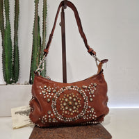 Campomaggi borsa linea TERESA borchie e rivetti argento e oro
