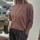 KIKISIX maglia BOTTONI GIOIELLO collo alto