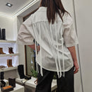 Camicia bianca con frange
