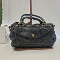 Campomaggi borsa bauletto nero rivetti oro