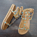 Sandalo modello gladiatore color cuoio accessorio turchese