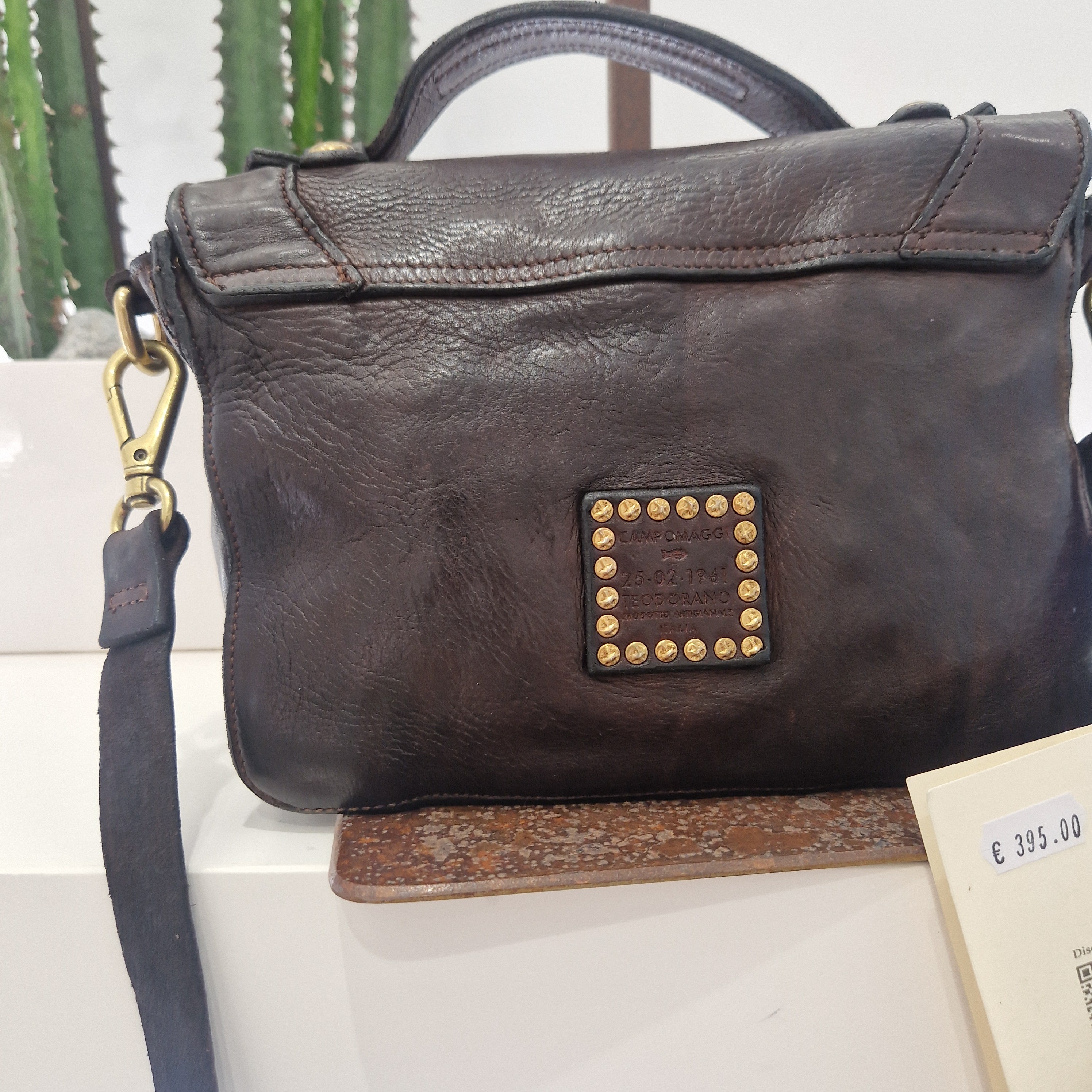 Campomaggi borsa color t.moro   linea AURORA cartella in pelle con borchie e strass