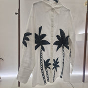 Camicia con palme ricamate