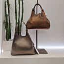 Gianni Chiarini  linea DUA formato medio pellame laminato