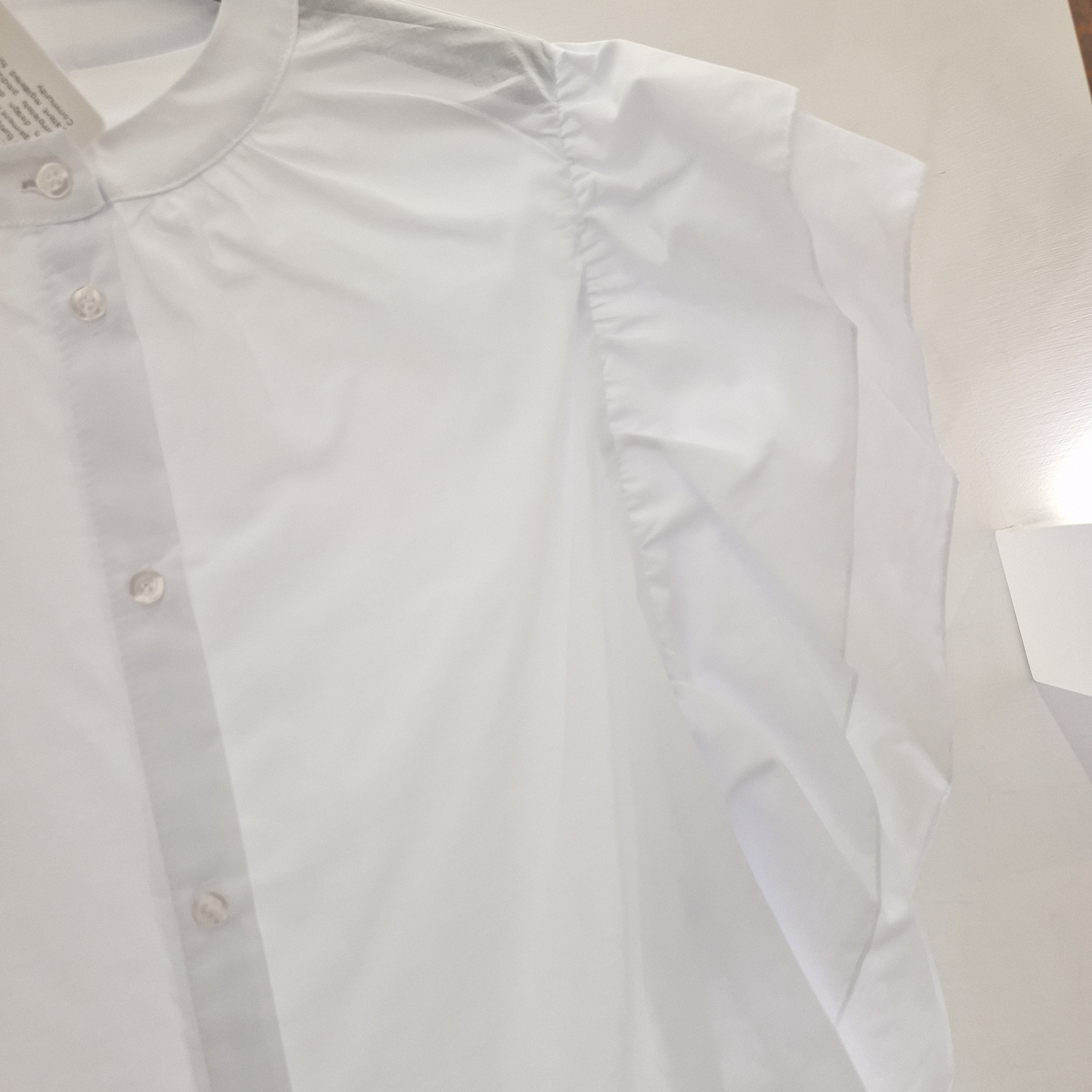Camicia bianca smanicata