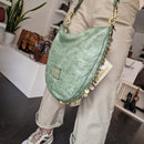 Campomaggi borsa linea GIANNA accessorio medaglie