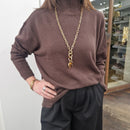 KIKISIX maglia BOTTONI GIOIELLO collo alto