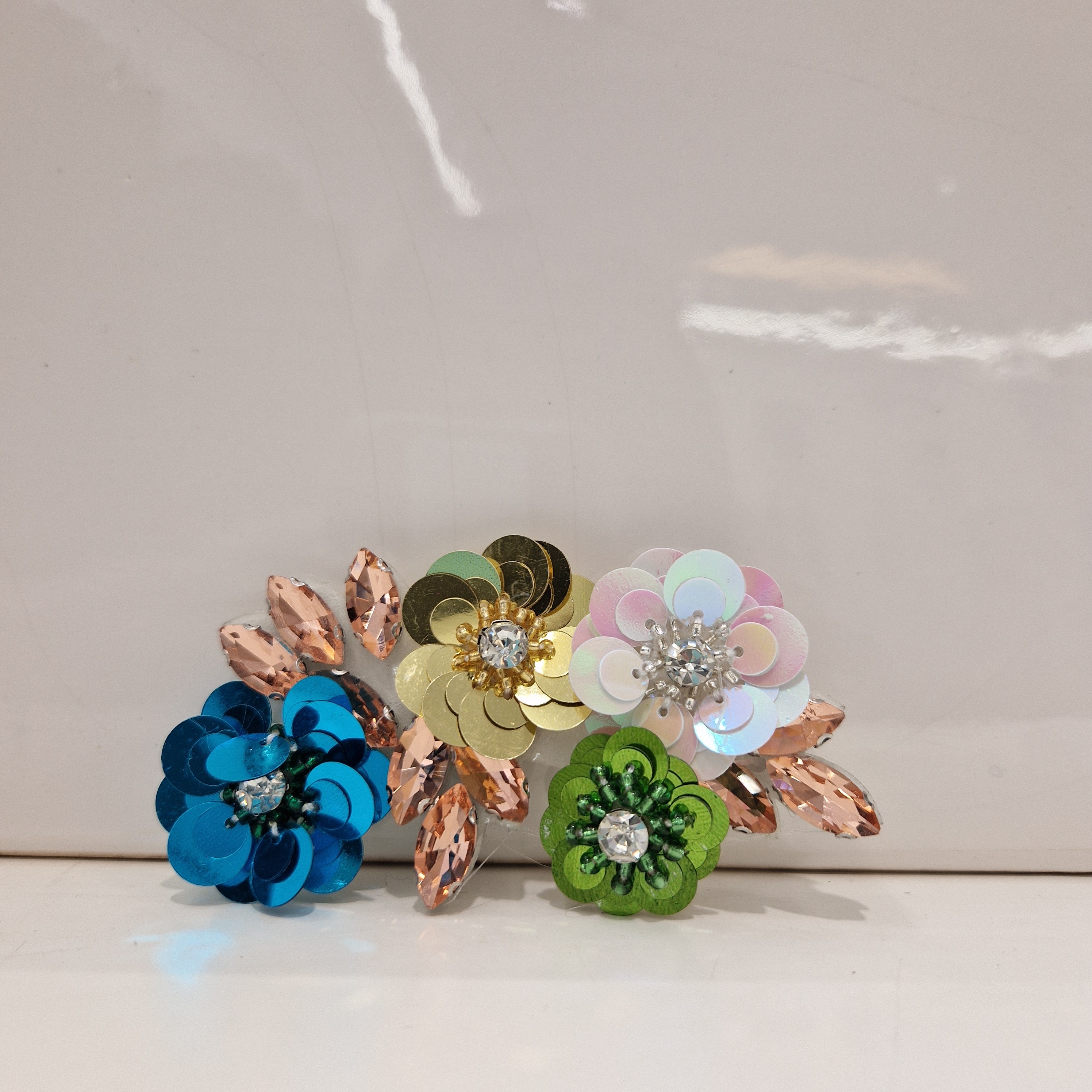 Spilla fiori paillettes