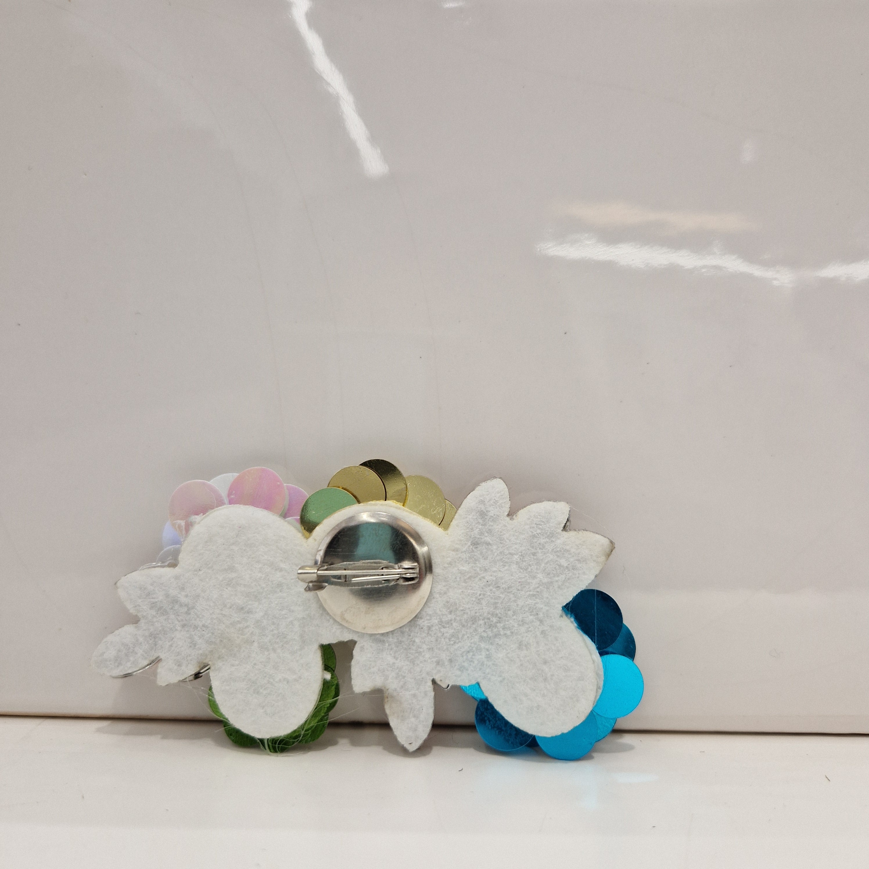 Spilla fiori paillettes